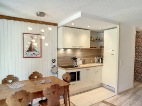 Les Menuires : 3 pièces rénové 40m² avec parking couvert et équipement complet, au pied des pistes - FR-1-178-380